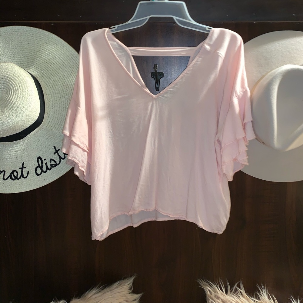 Light pink top.